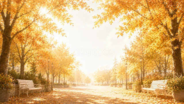 黄金色の紅葉並木とベンチがある秋の公園背景